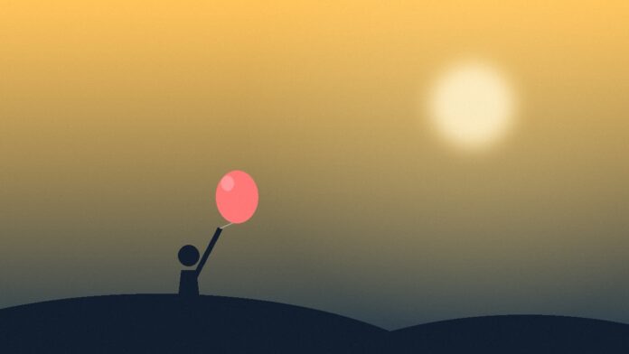 Silhueta de criança a segurar um balão ao pôr do sol, a evocar o apoio Garantia para a Infância em Portugal